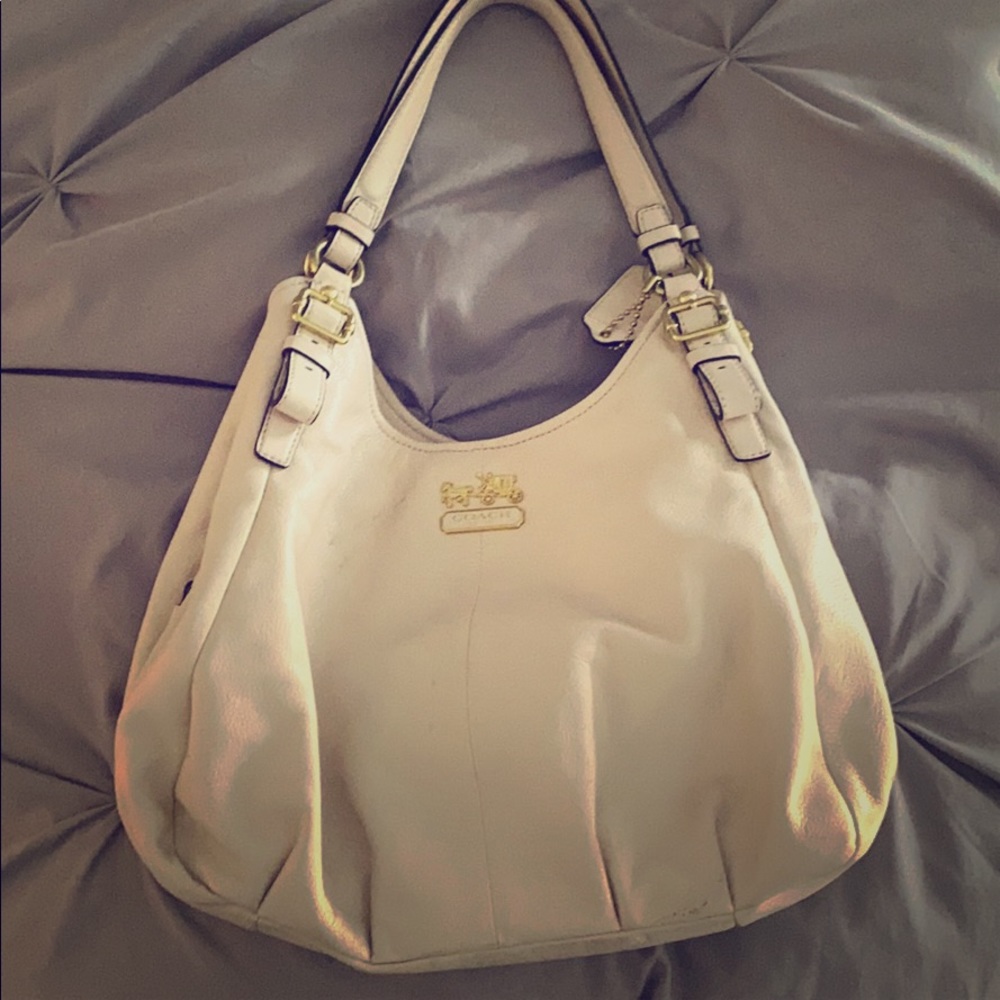 Coach beige purse with red inside